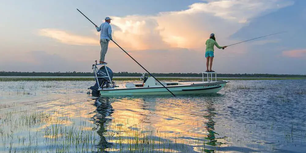 two people fishing from kayak